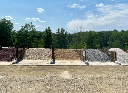Mounds of aggregate materials at The Dirt Depot yard in New Auburn, Wisconsin